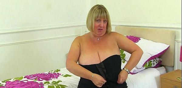  British milf Melons Marie works her huge tits and pussy